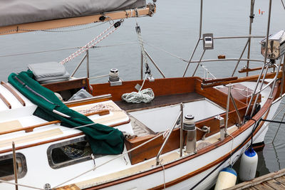 Boats moored at harbor