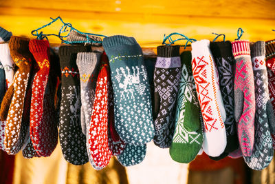 Close-up of clothes hanging on rack