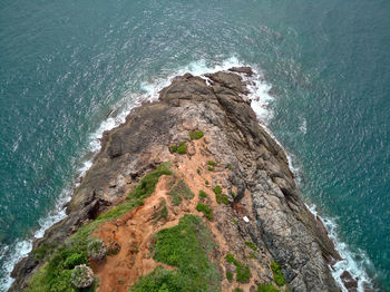 High angle view of rock formation on beach