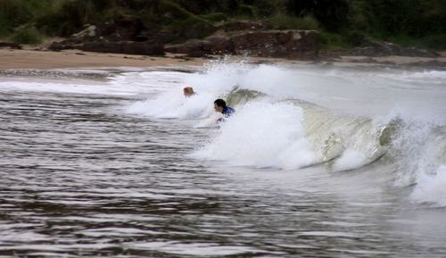 Blurred motion of water splashing in sea