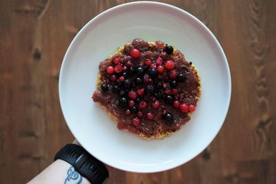 High angle view of strawberries in plate