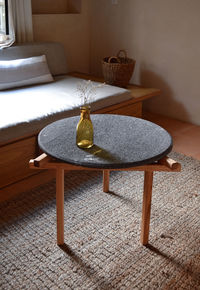 Designer side or center coffee table, top in natural stone, volcanic stone, quarry or terrazz