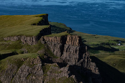 High angle view of rock formations on shore