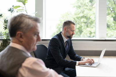 Business colleagues working at office