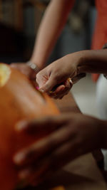 Cropped hands of woman preparing food