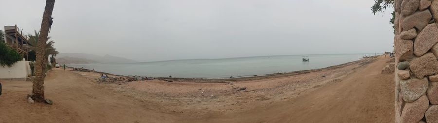 Panoramic view of beach against sky