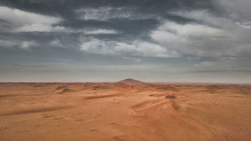 Scenic view of desert against sky