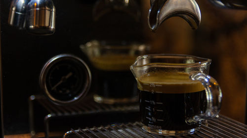 Close-up of coffee served on table