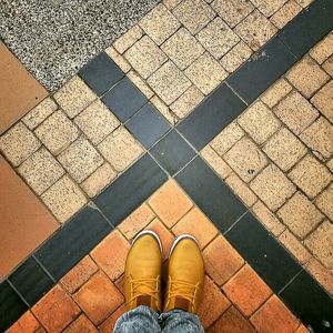 Low section of person standing on ground