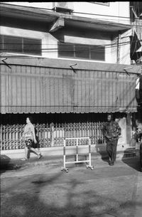 Men in shopping cart