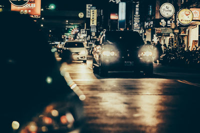 Traffic on city street at night