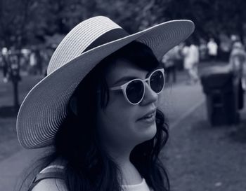 Close-up of young woman in park