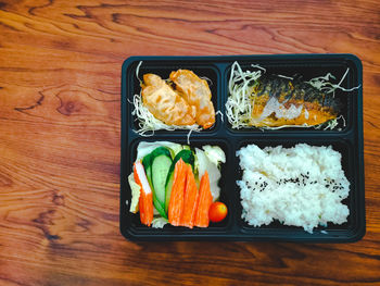 High angle view of sushi served on table