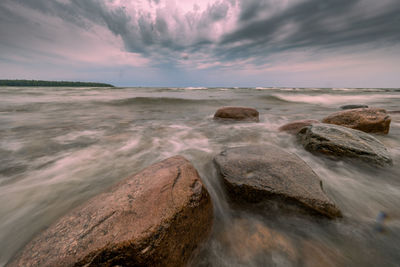 Scenic view of sea against sky during sunset