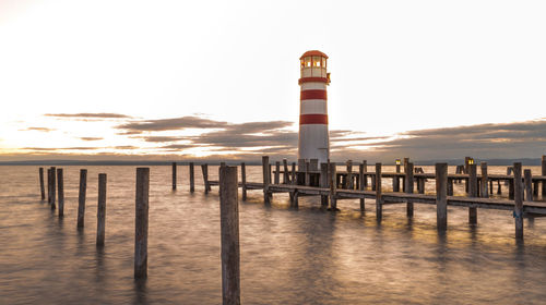 Pier over sea against sky