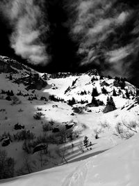 Scenic view of mountains against sky during winter