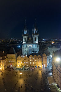Illuminated buildings in city at night