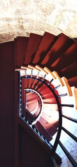 Directly below shot of spiral staircase in building