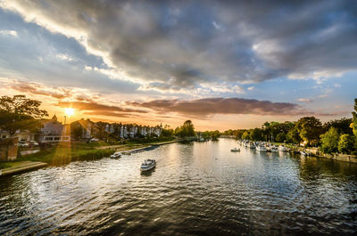 Scenic view of lake against sky during sunset