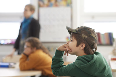 Boy sitting in classroom