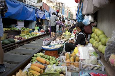 High angle view of man for sale at market stall