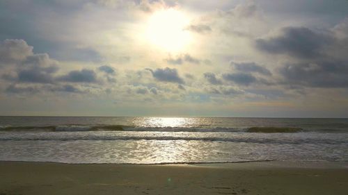 Scenic view of sea at sunset