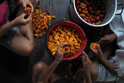 High angle view of people working in kitchen