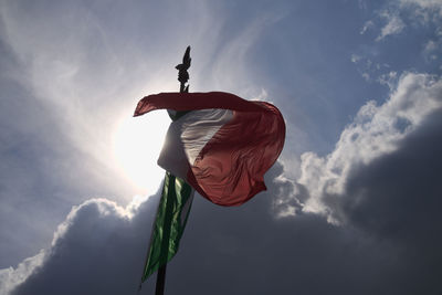 Low angle view of flag against sky