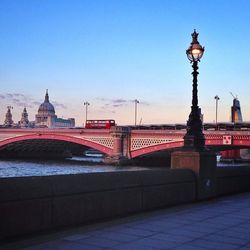 Bridge over river against clear sky