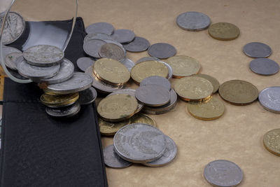 High angle view of coins