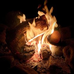 Bonfire on rock at night