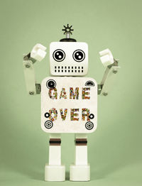 Close-up of information sign against wall