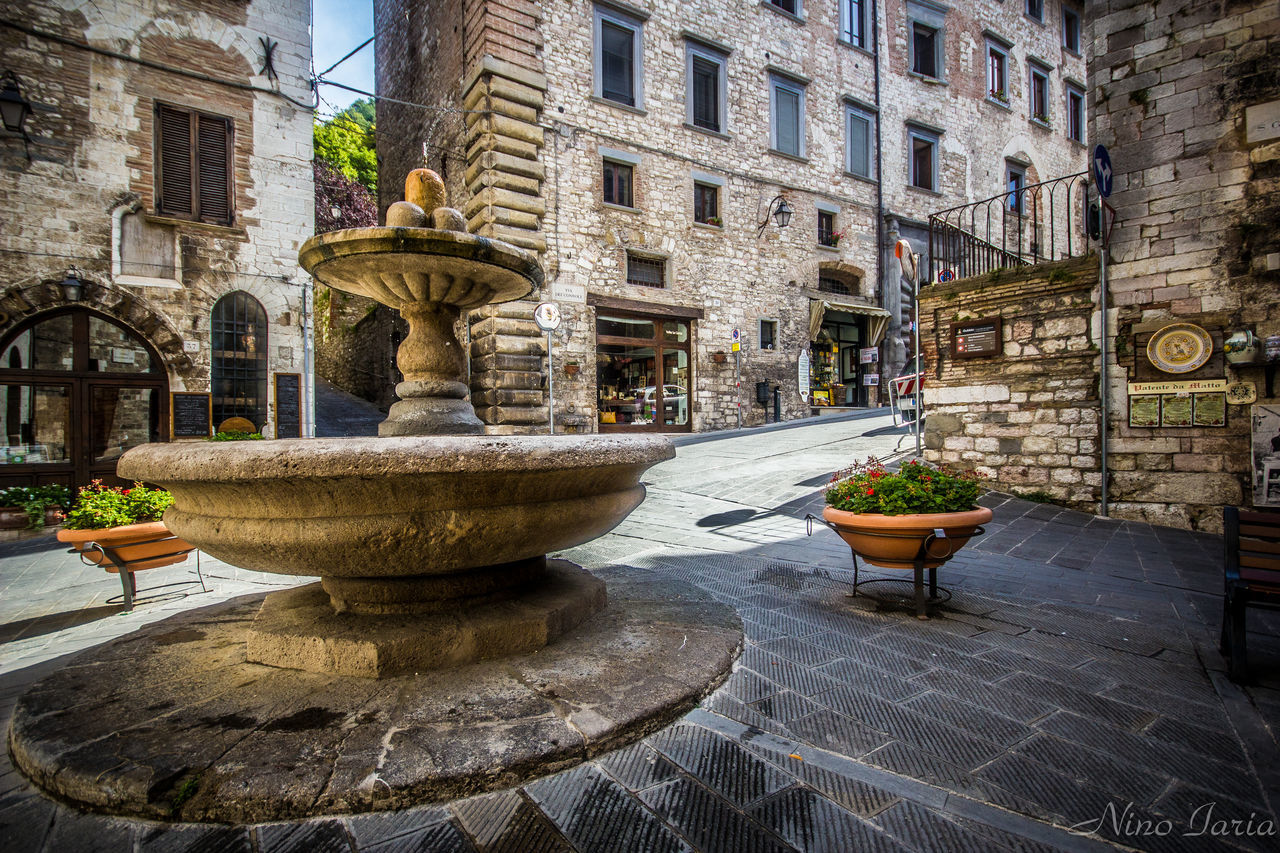 FOUNTAIN IN FRONT OF BUILDING