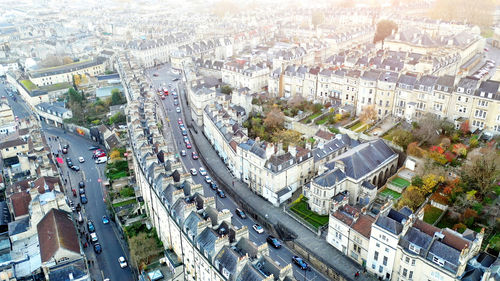 High angle view of street amidst buildings in city