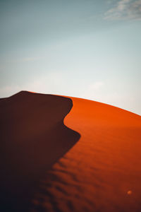 Scenic view of desert against clear sky