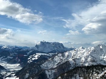 Scenic view of snowcapped mountains against sky