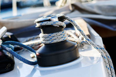 Close-up of rope rolled up on boat