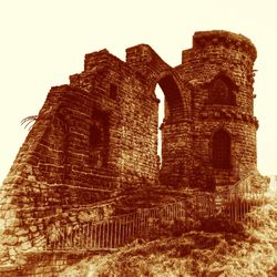 Low angle view of old ruin building