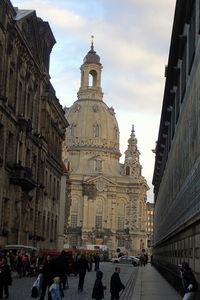 Tourists in front of building