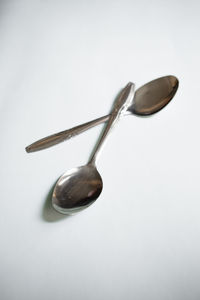 High angle view of wineglass against white background