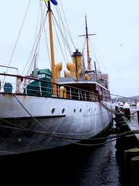 Silhouette of crane at harbor