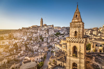 Buildings in city against sky