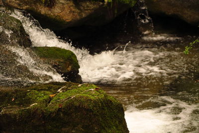 Stream flowing through rocks