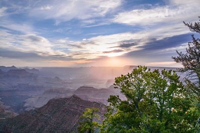 Scenic view of landscape against sky during sunset