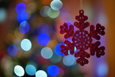 Close-up of christmas decoration hanging on tree