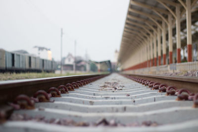 Close-up of railroad tracks at station