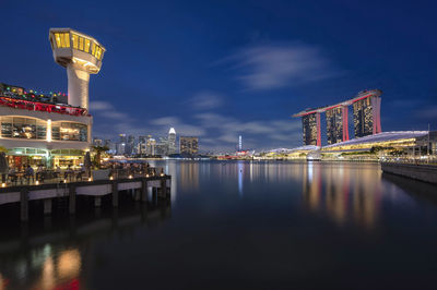 Illuminated buildings at waterfront