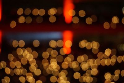 Defocused image of illuminated lights at night