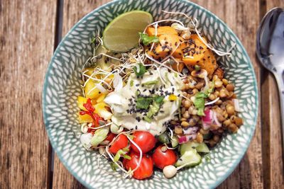 High angle view of fruit salad in bowl on table