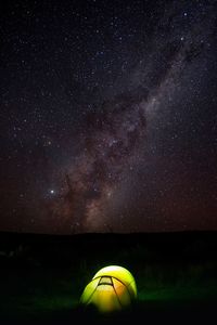 Tent against sky at night